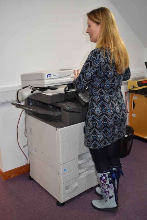 Wellies at the photocopier